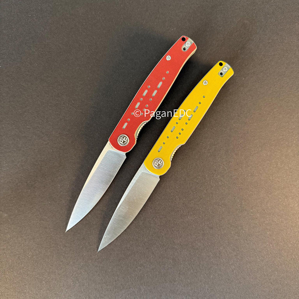 Two PFE07 Morse folding knives displayed open on a dark background, featuring satin-finished 154CM steel blades and perforated G10 handles in red and yellow, designed for lightweight everyday carry.
