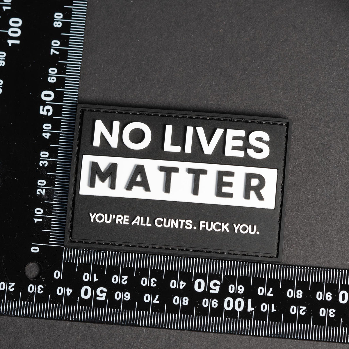 No Lives Matter PVC morale patch shown with size reference ruler