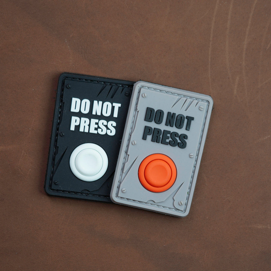 Do Not Press PVC morale patches in black and grey color variants
