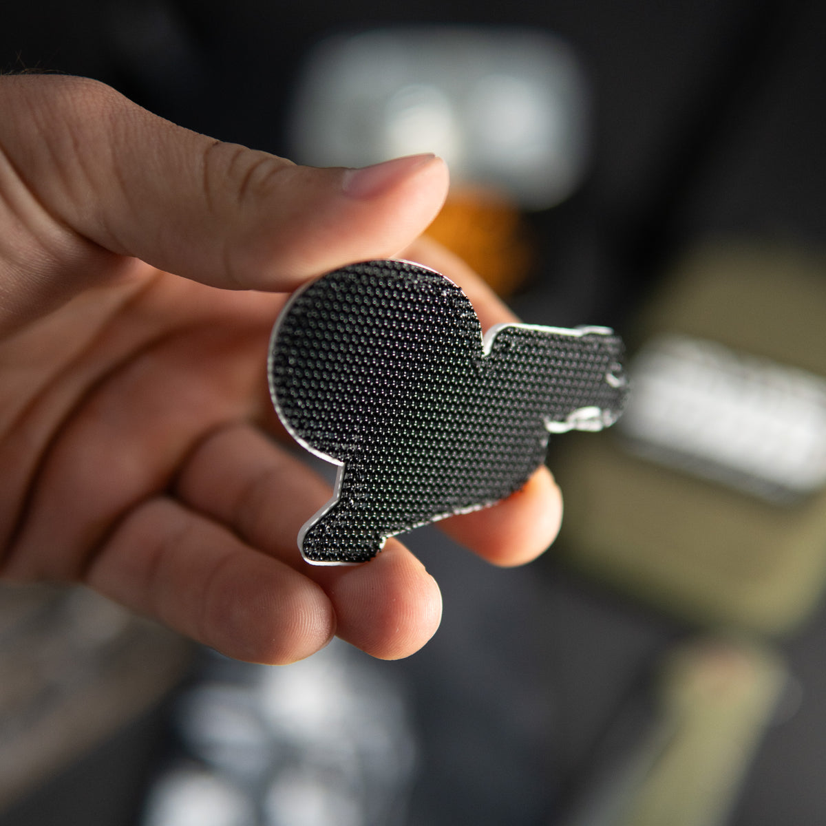 Back of Hey You Dropped This PVC morale patch showing black hook backing
