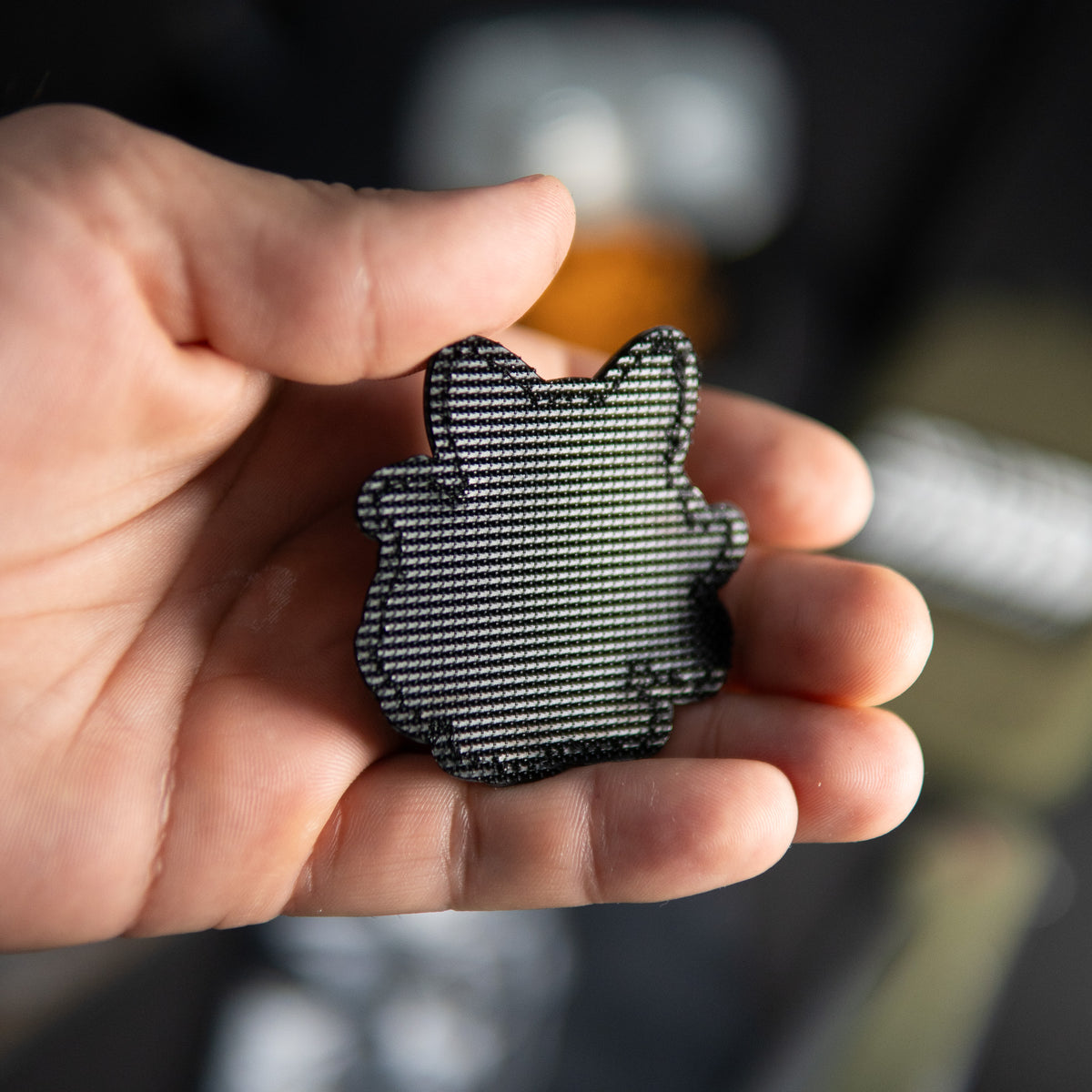 Back of PaganEDC Cat PVC morale patch showing black hook backing