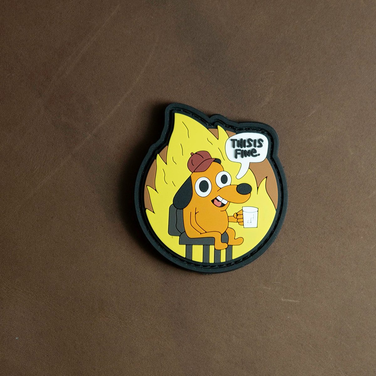 This Is Fine PVC morale patch displayed on an EDC background
