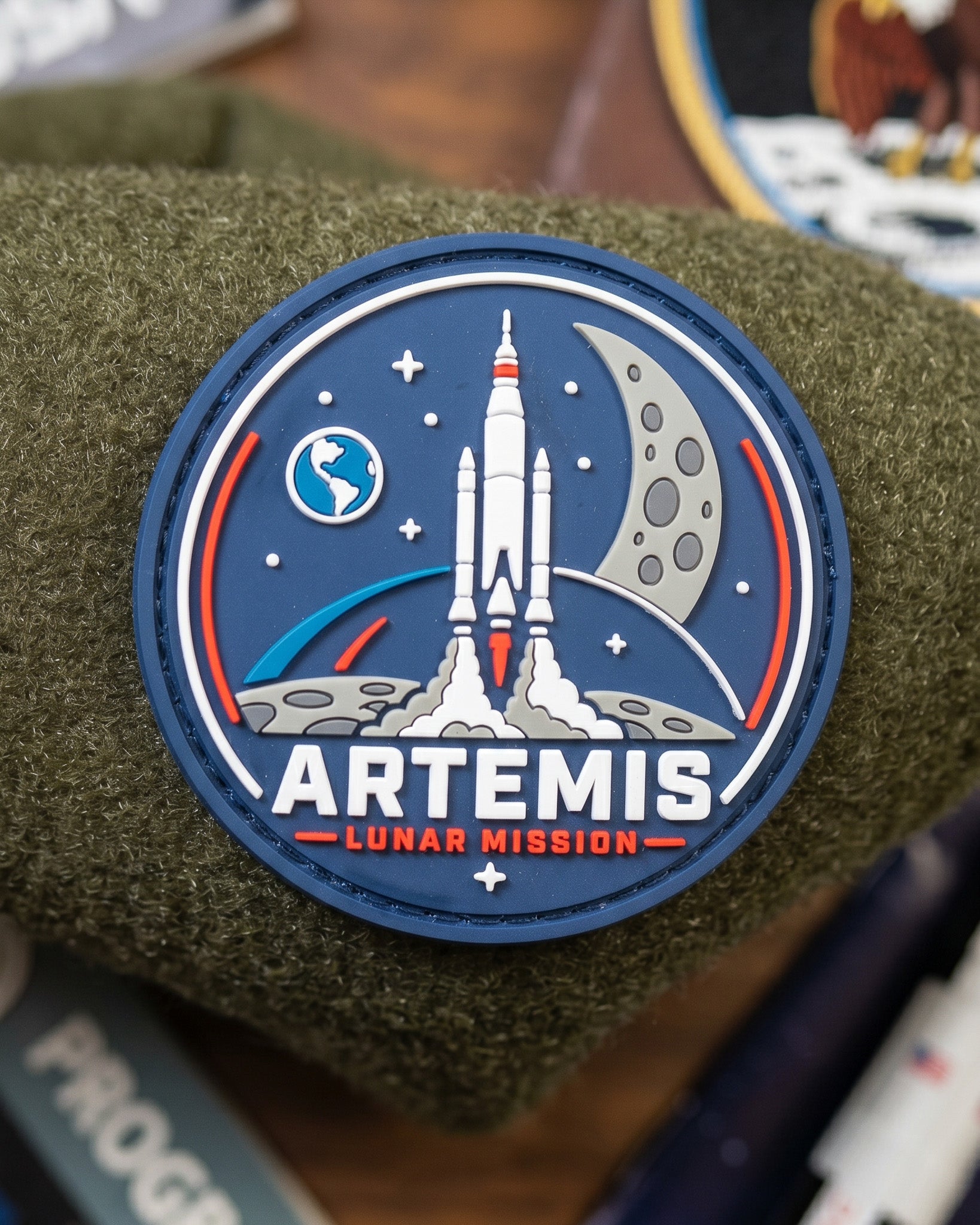 Artemis Lunar Mission PVC morale patch with rocket launch and moon design on tactical loop surface.